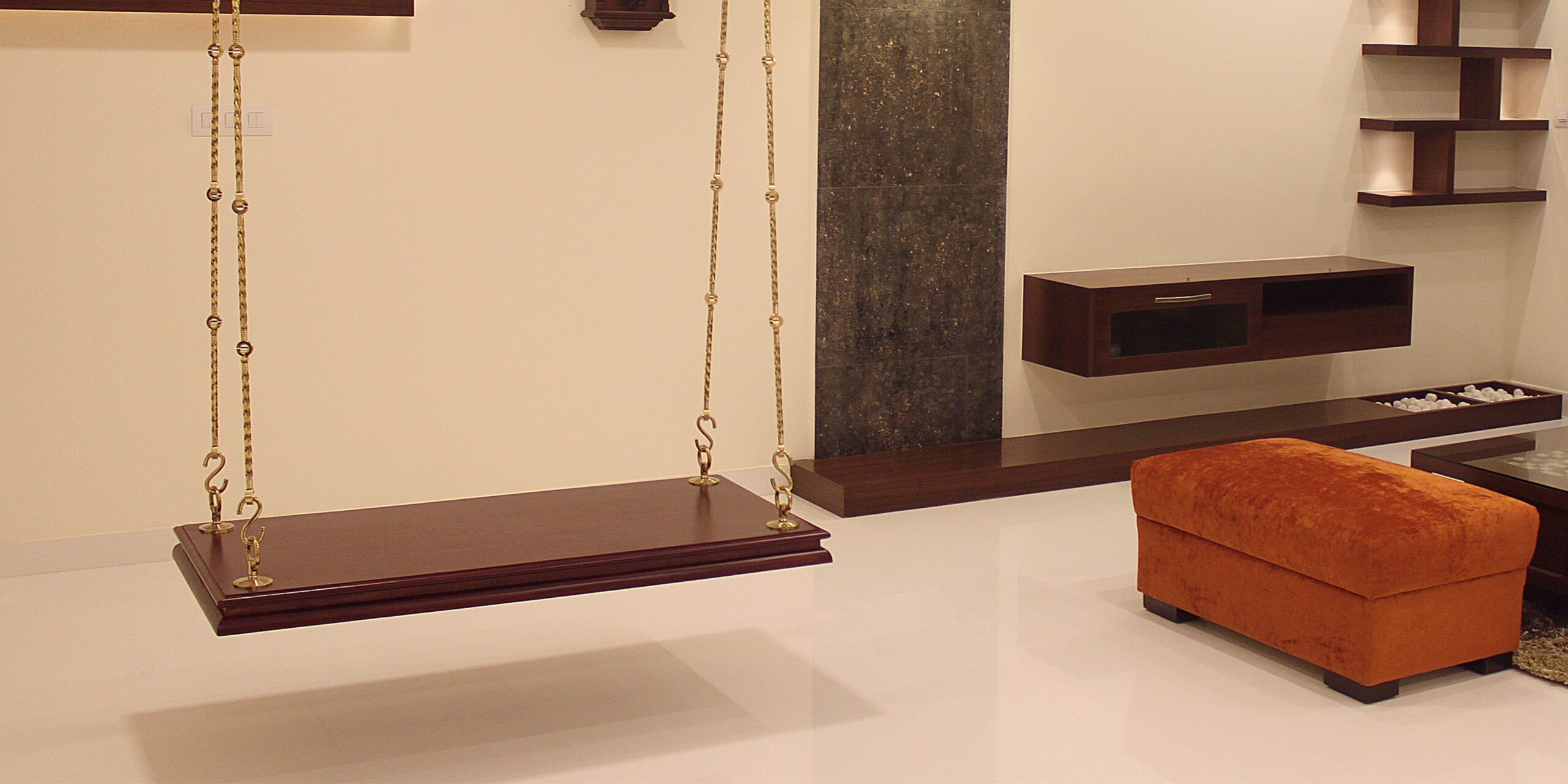 A traditional unjal is the highlight of this vibrant living room